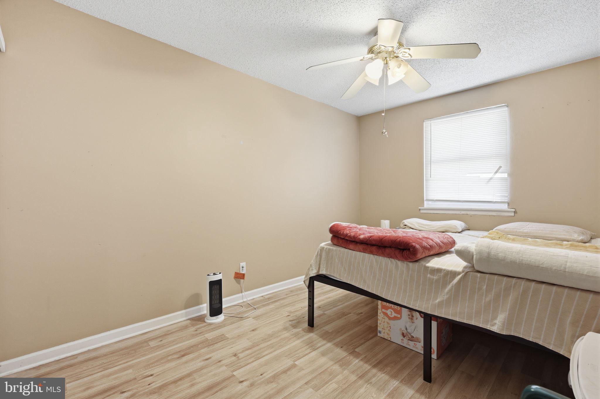 5203 Bay Road, Unit N Bensalem, PA 19020 - Photo 16 of 27 a room with furniture and a window