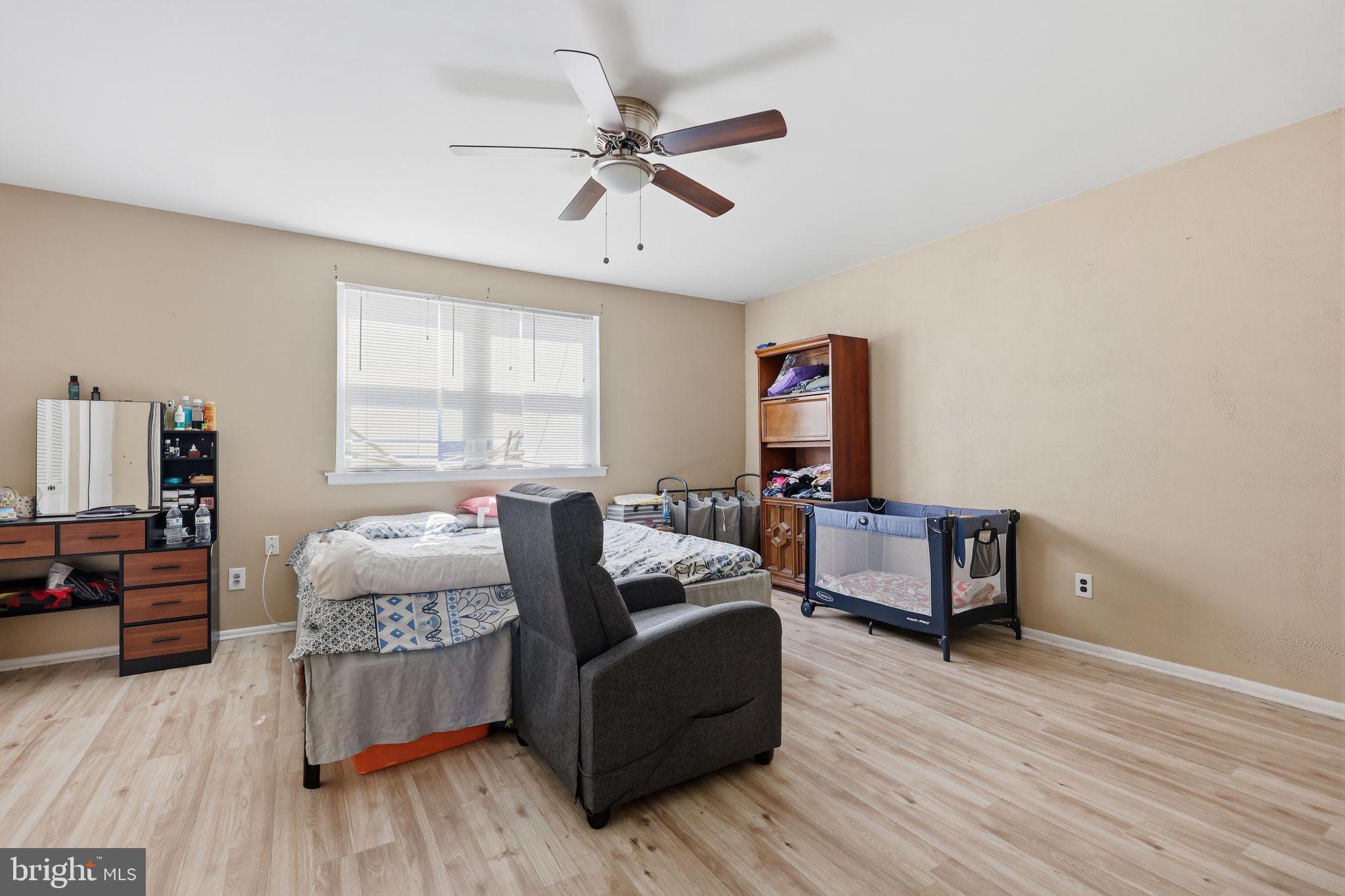 5203 Bay Road, Unit N Bensalem, PA 19020 - Photo 19 of 27 a living room with furniture and a window