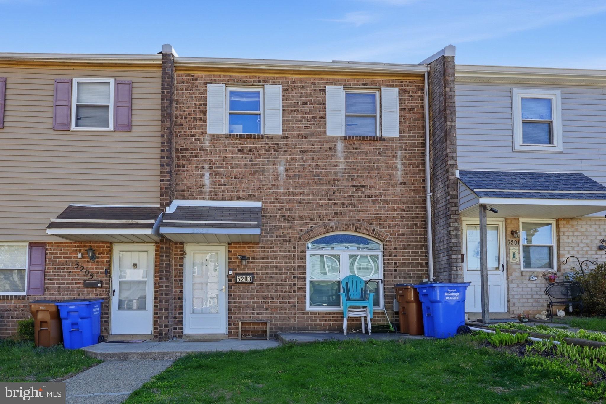 5203 Bay Road, Unit N Bensalem, PA 19020 - Photo 2 of 27 a front view of a house with garden