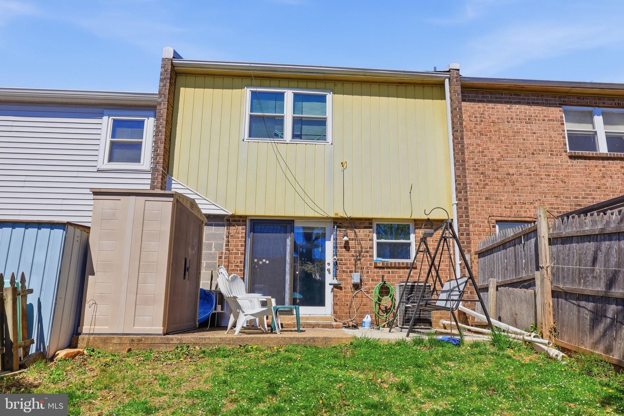 5203 Bay Road, Unit N Bensalem, PA 19020 - Photo 26 of 27 a view of a house with backyard and porch