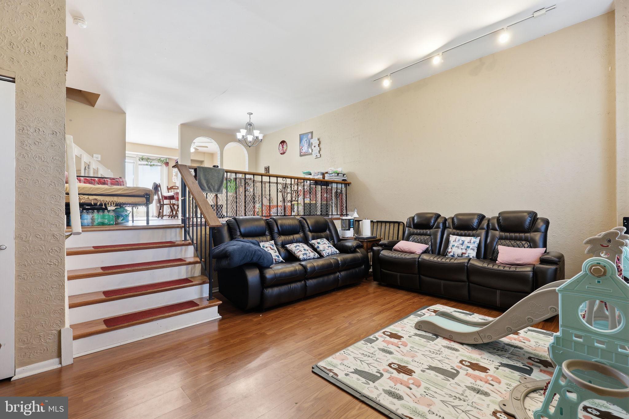 5203 Bay Road, Unit N Bensalem, PA 19020 - Photo 4 of 27 a living room with furniture and a rug