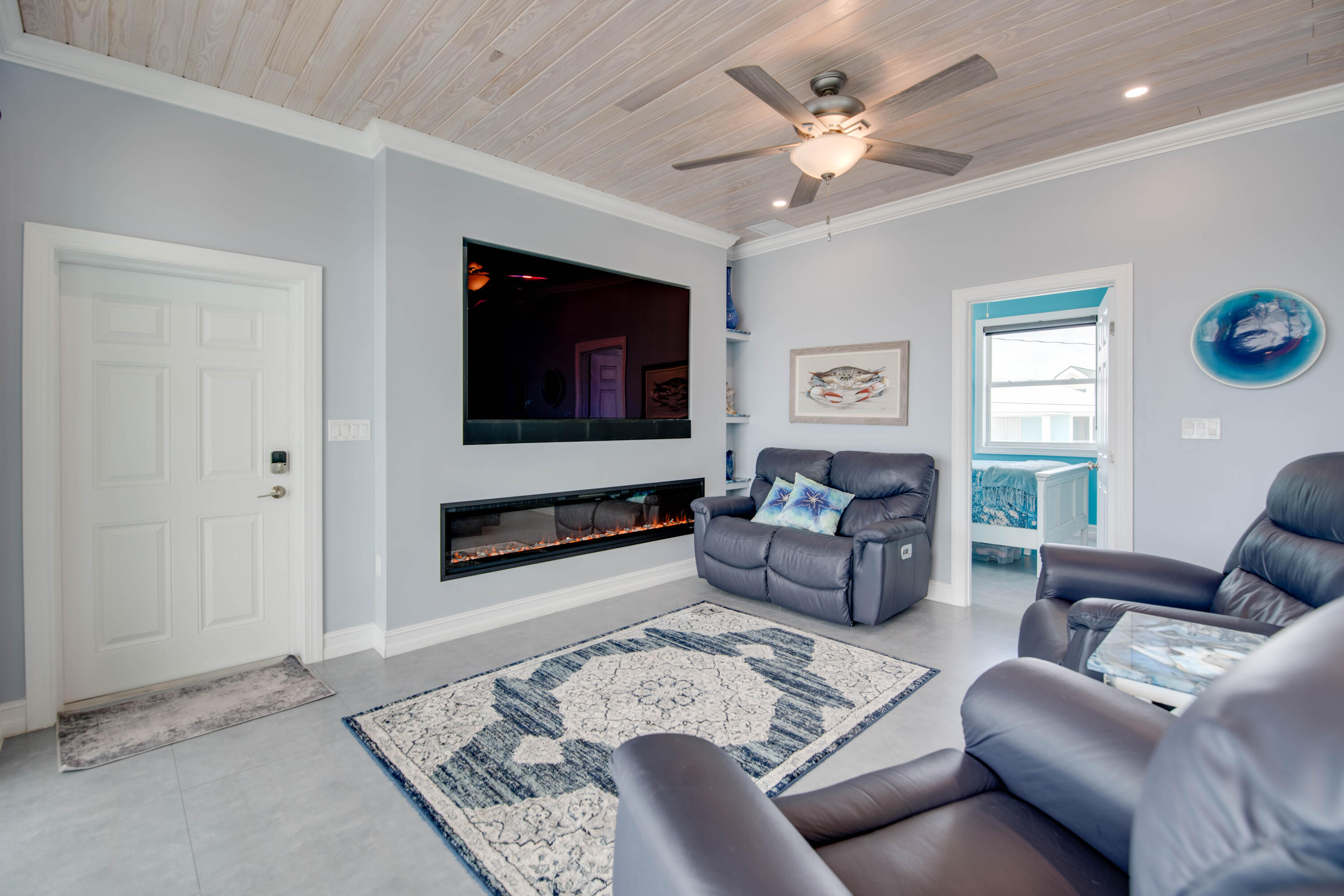 747 La Fitte Road Summerland Key, FL 33042 - Photo 69 of 103 a living room with furniture and a flat screen tv