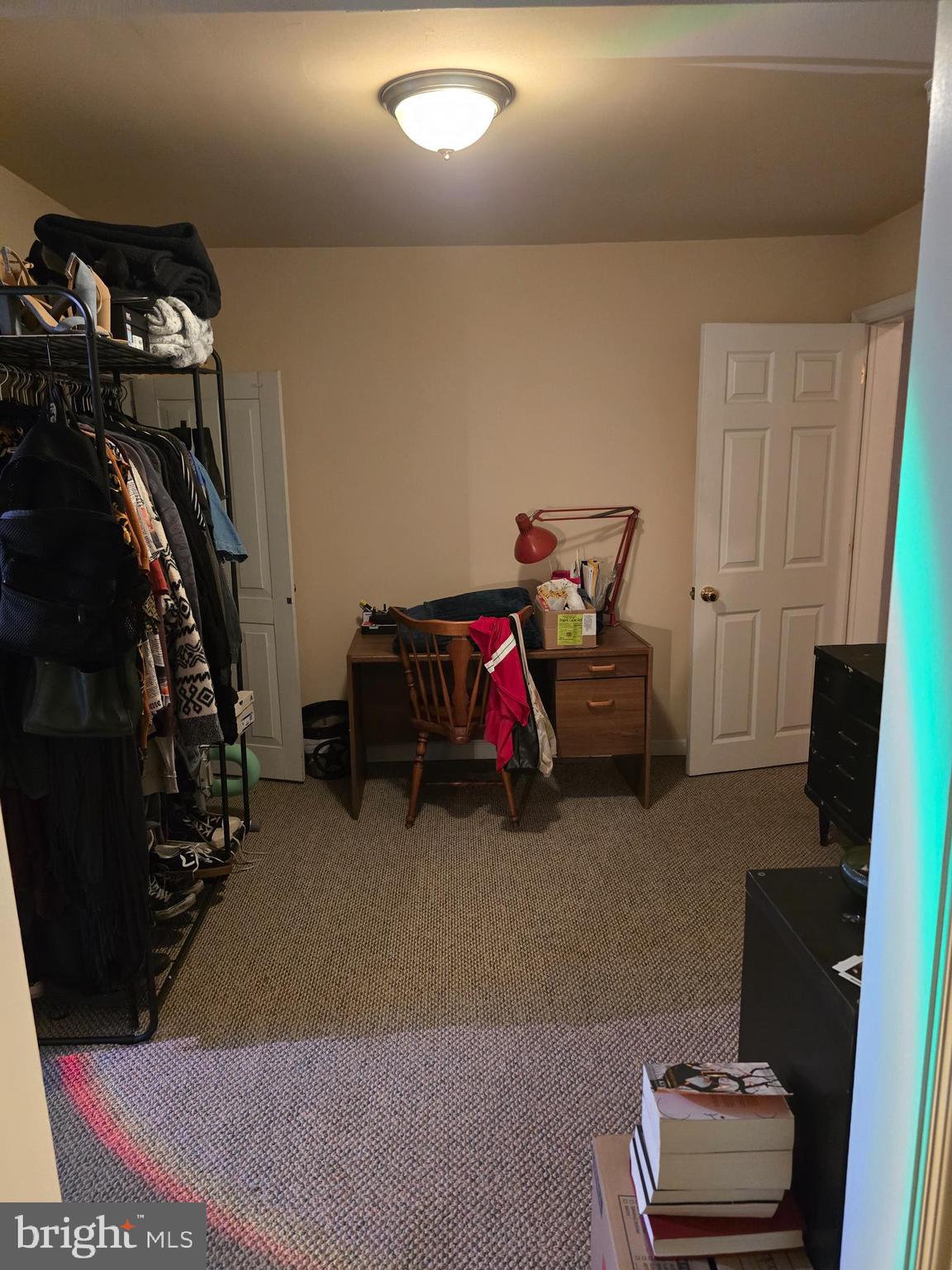 4894 Old Easton Road Doylestown, PA 18902 - Photo 15 of 19 a bedroom with bed and a couch