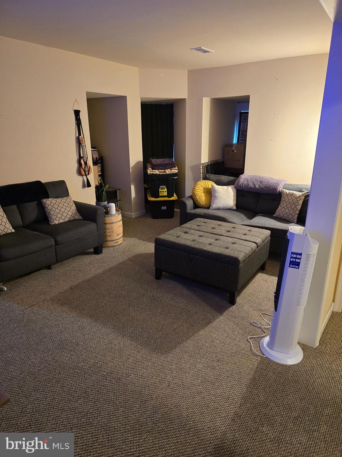4894 Old Easton Road Doylestown, PA 18902 - Photo 7 of 19 a living room with furniture and a flat screen tv