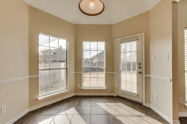 a view of livingroom with furniture wooden floor and window