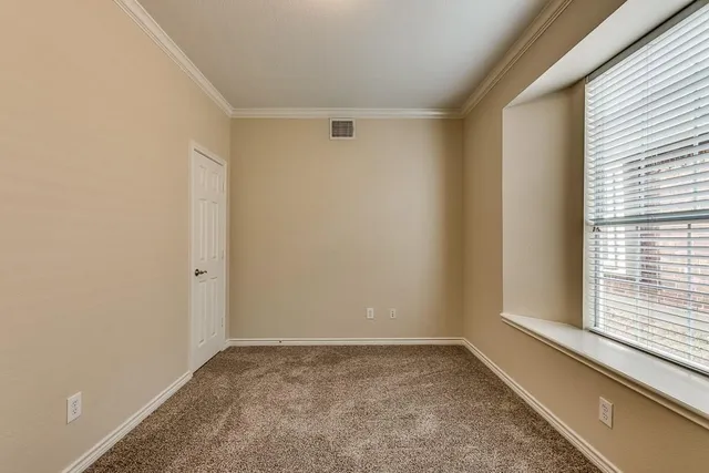 a view of a small space with a window