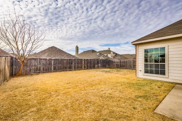 a house view with swimming pool in front of it