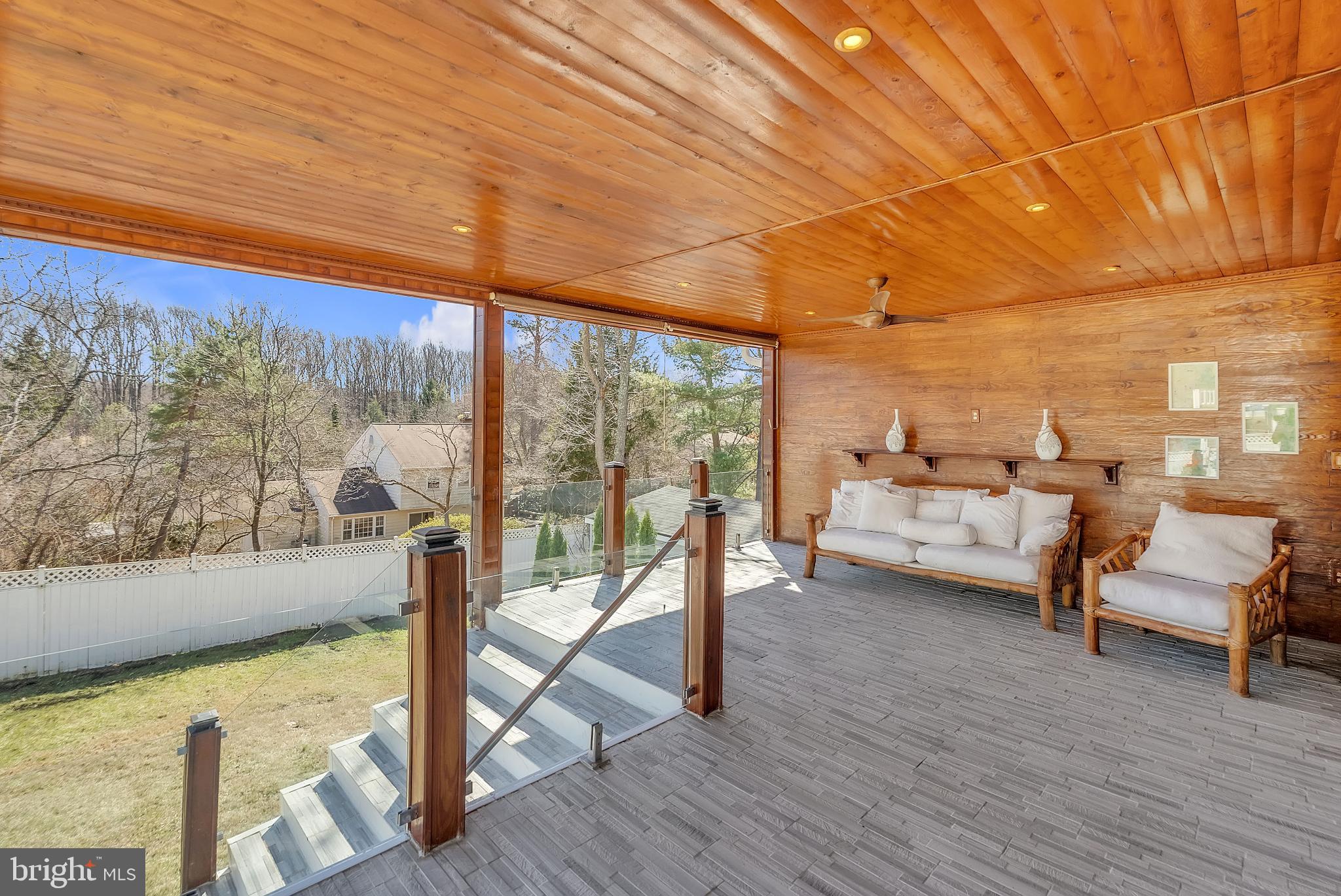 14933 Wellwood Road Silver Spring, MD 20905 - Photo 14 of 50 Serene outdoor retreat with wooden accents.