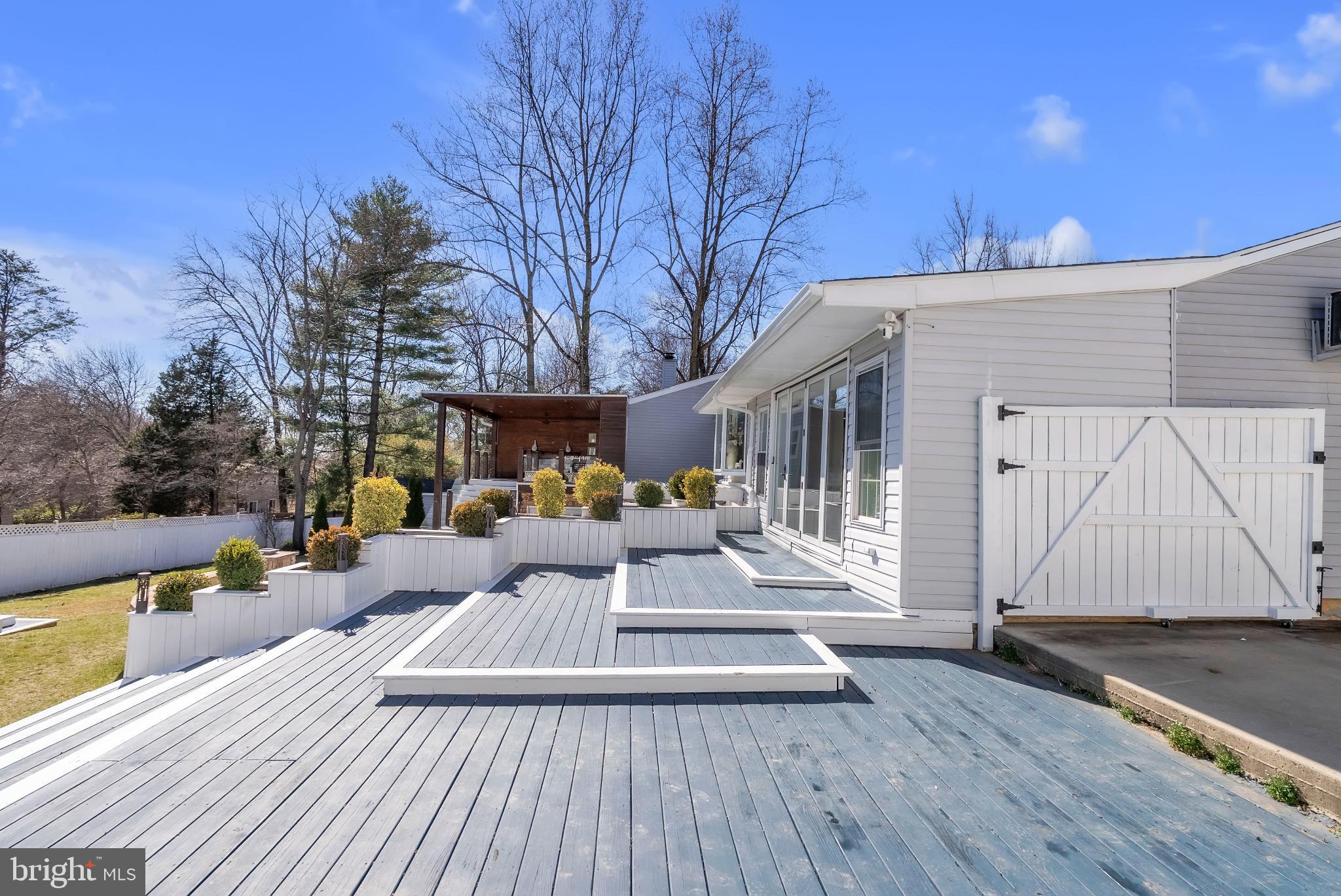 14933 Wellwood Road Silver Spring, MD 20905 - Photo 22 of 50 Tiered terraces off of family room.
