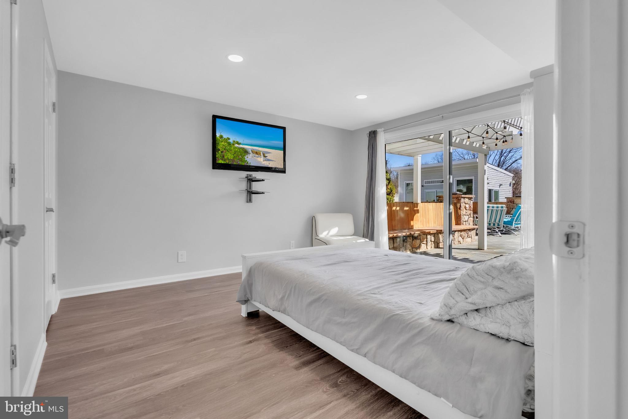 14933 Wellwood Road Silver Spring, MD 20905 - Photo 28 of 50 Serene second bedroom with outdoor views.