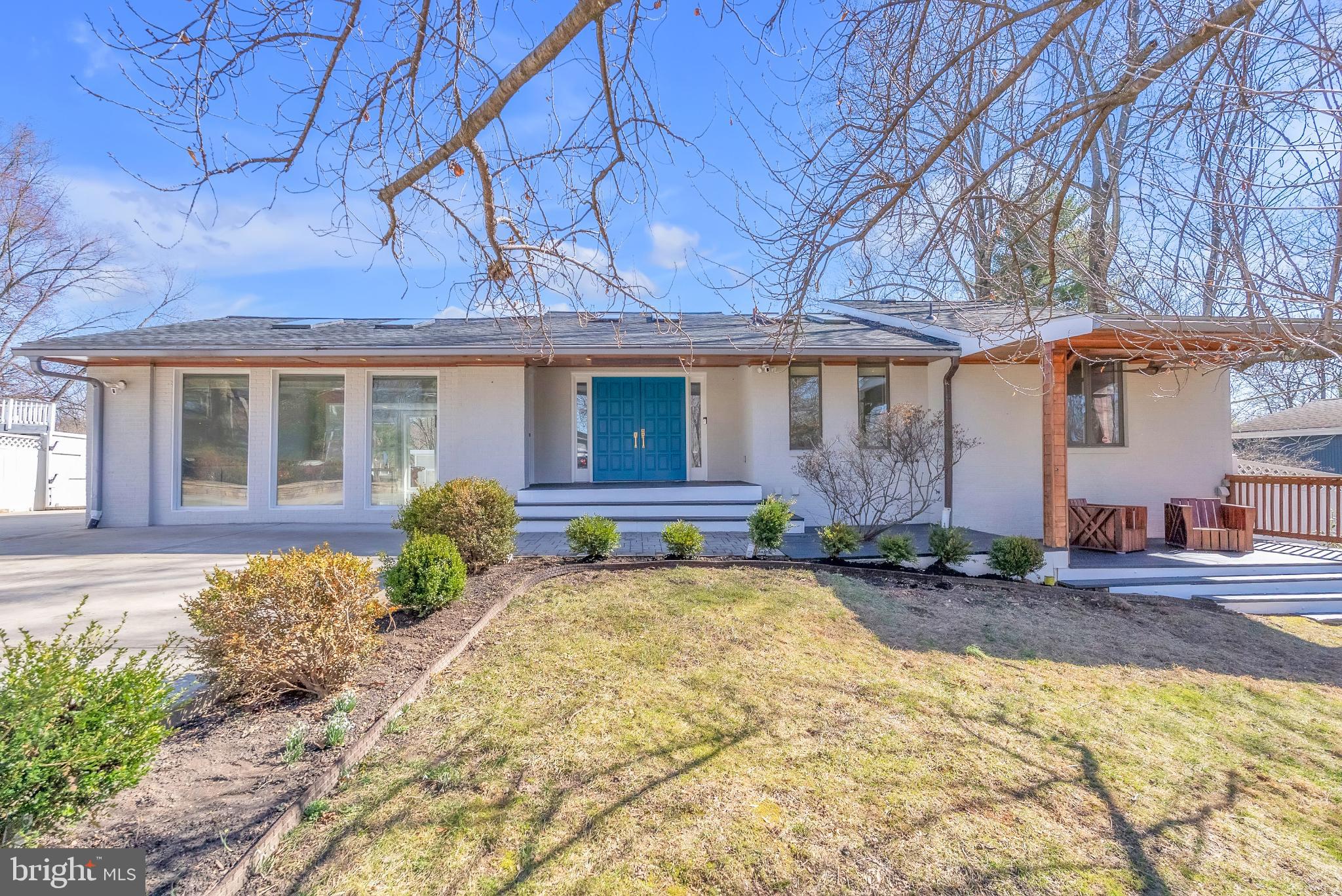 14933 Wellwood Road Silver Spring, MD 20905 - Photo 3 of 50 Charming modern home with vibrant entrance.