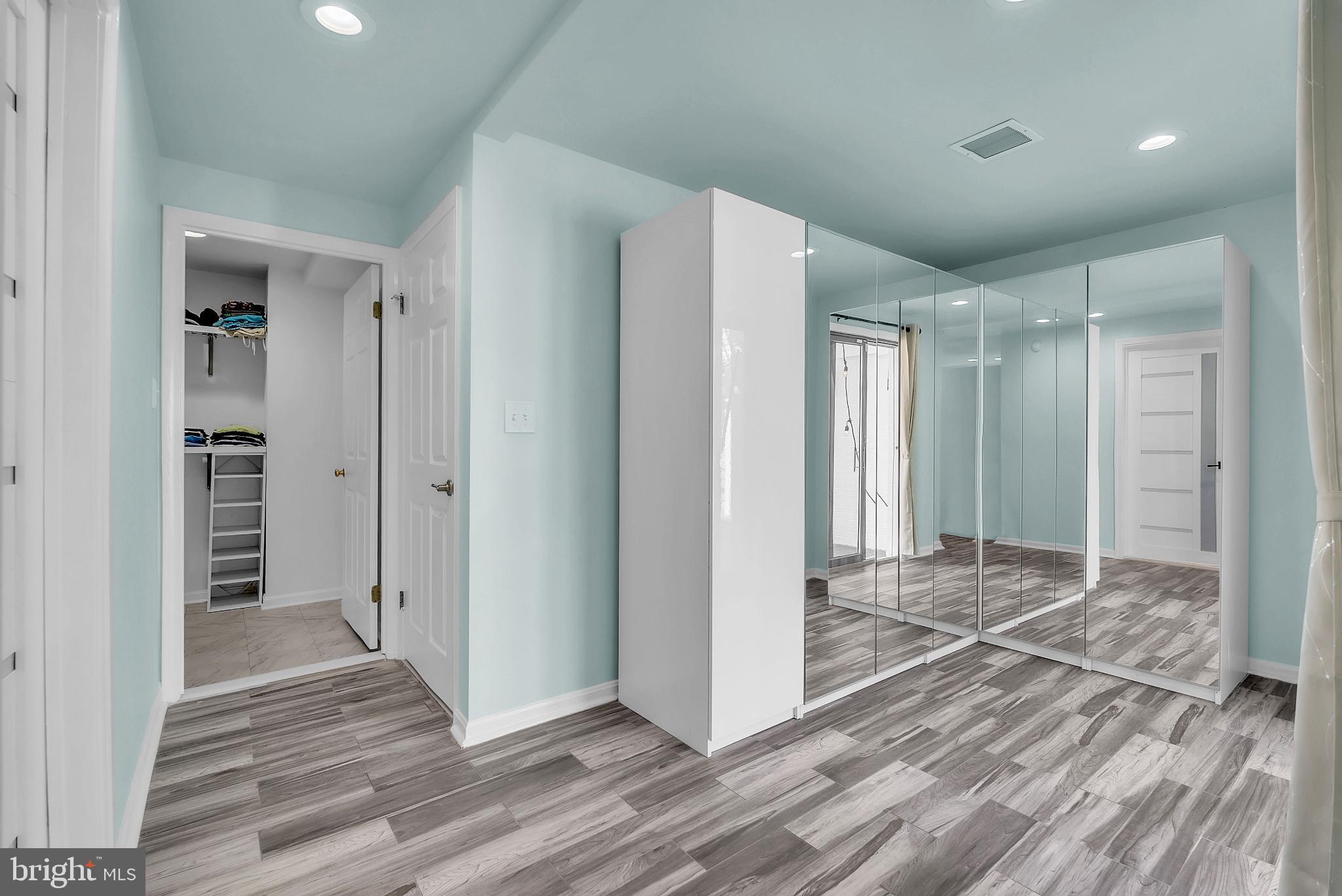 14933 Wellwood Road Silver Spring, MD 20905 - Photo 33 of 50 Dressing area with wardrobe in primary.