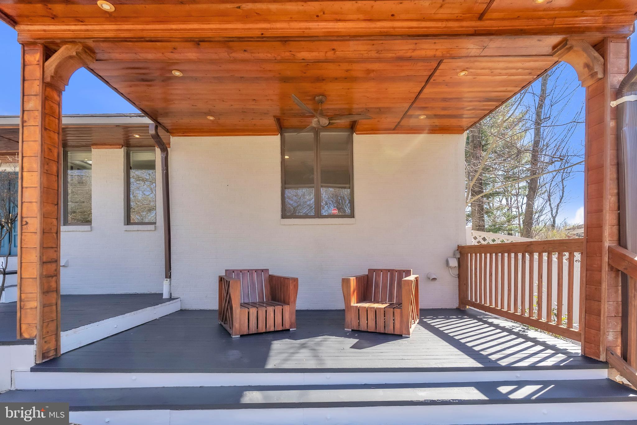 14933 Wellwood Road Silver Spring, MD 20905 - Photo 4 of 50 Charming porch with rustic wooden accents.