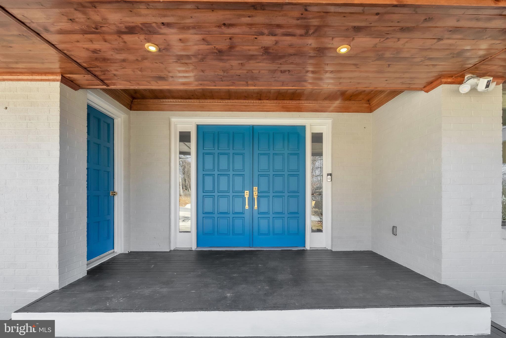 14933 Wellwood Road Silver Spring, MD 20905 - Photo 5 of 50 Vibrant blue doors invite you home.