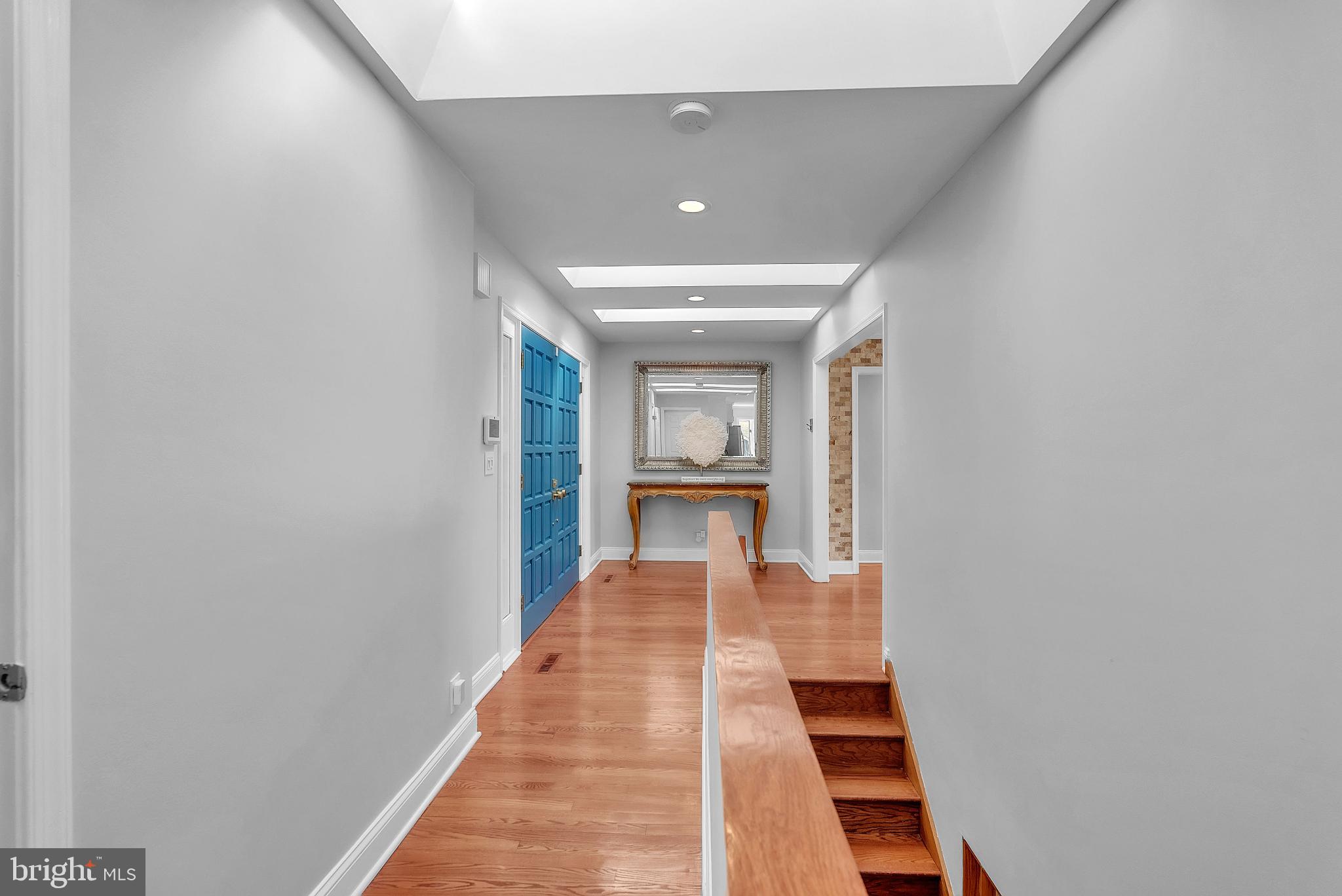 14933 Wellwood Road Silver Spring, MD 20905 - Photo 6 of 50 Bright hallway with skylights.