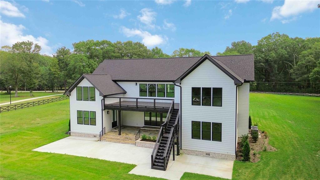 1604 Greendale Road Covington, GA 30014 - Photo 11 of 68 a view of house with backyard