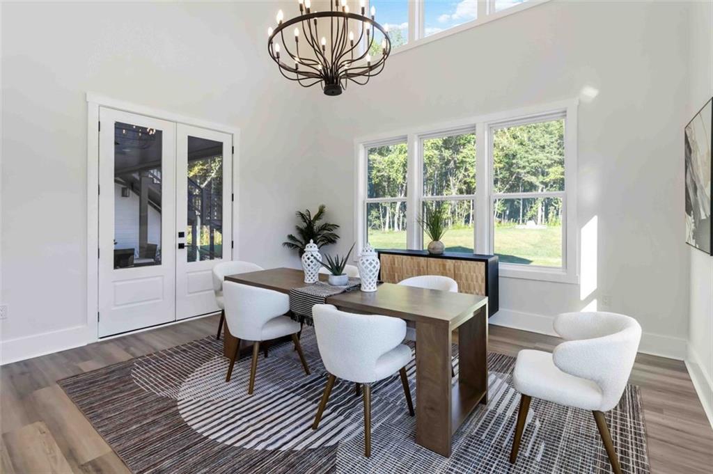 1604 Greendale Road Covington, GA 30014 - Photo 12 of 23 a living room with furniture a table and a large window