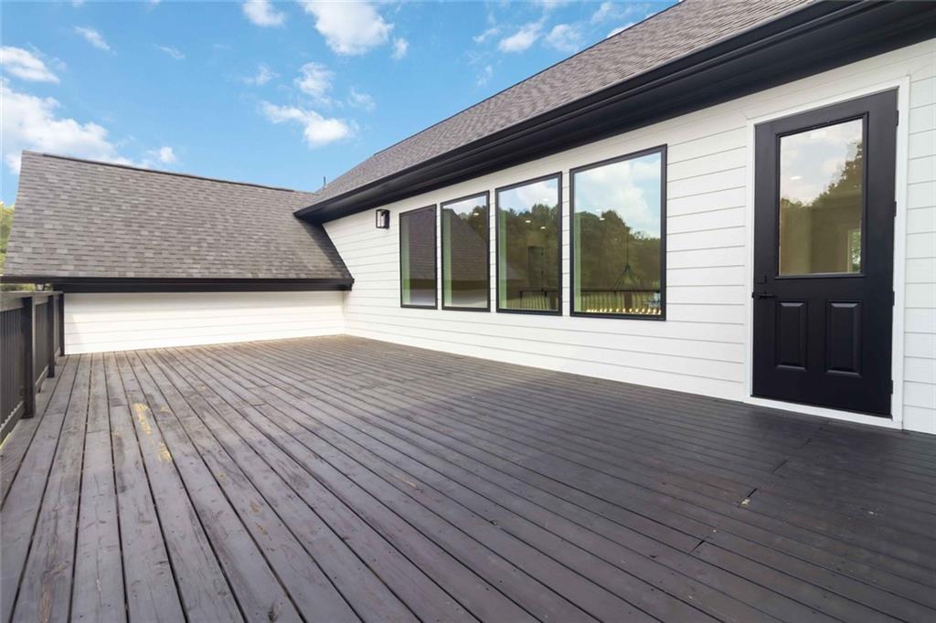 1604 Greendale Road Covington, GA 30014 - Photo 65 of 68 a view of outdoor space and deck with wooden floor