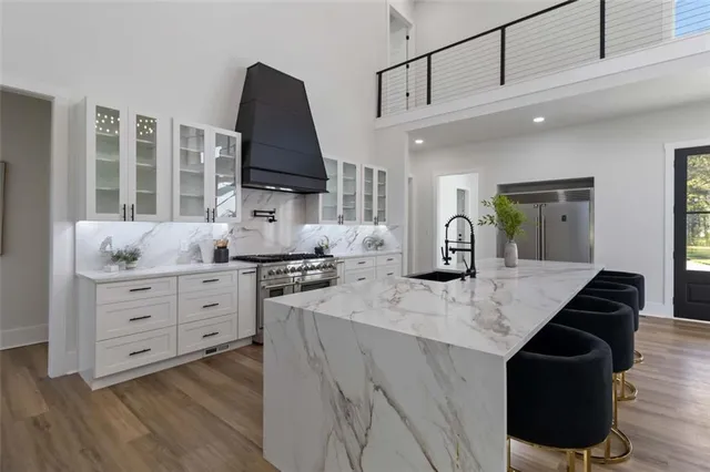 a kitchen with cabinets appliances