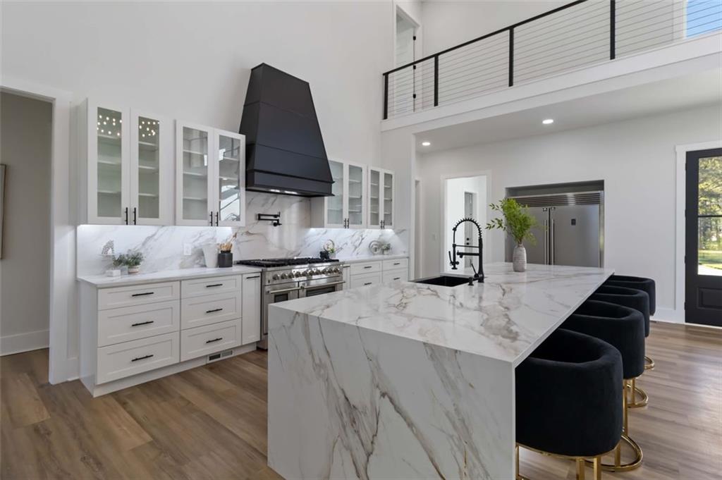 1604 Greendale Road Covington, GA 30014 - Photo 8 of 23 a kitchen with cabinets appliances