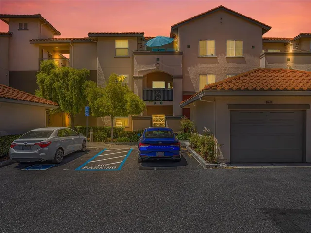 a car parked in front of a house