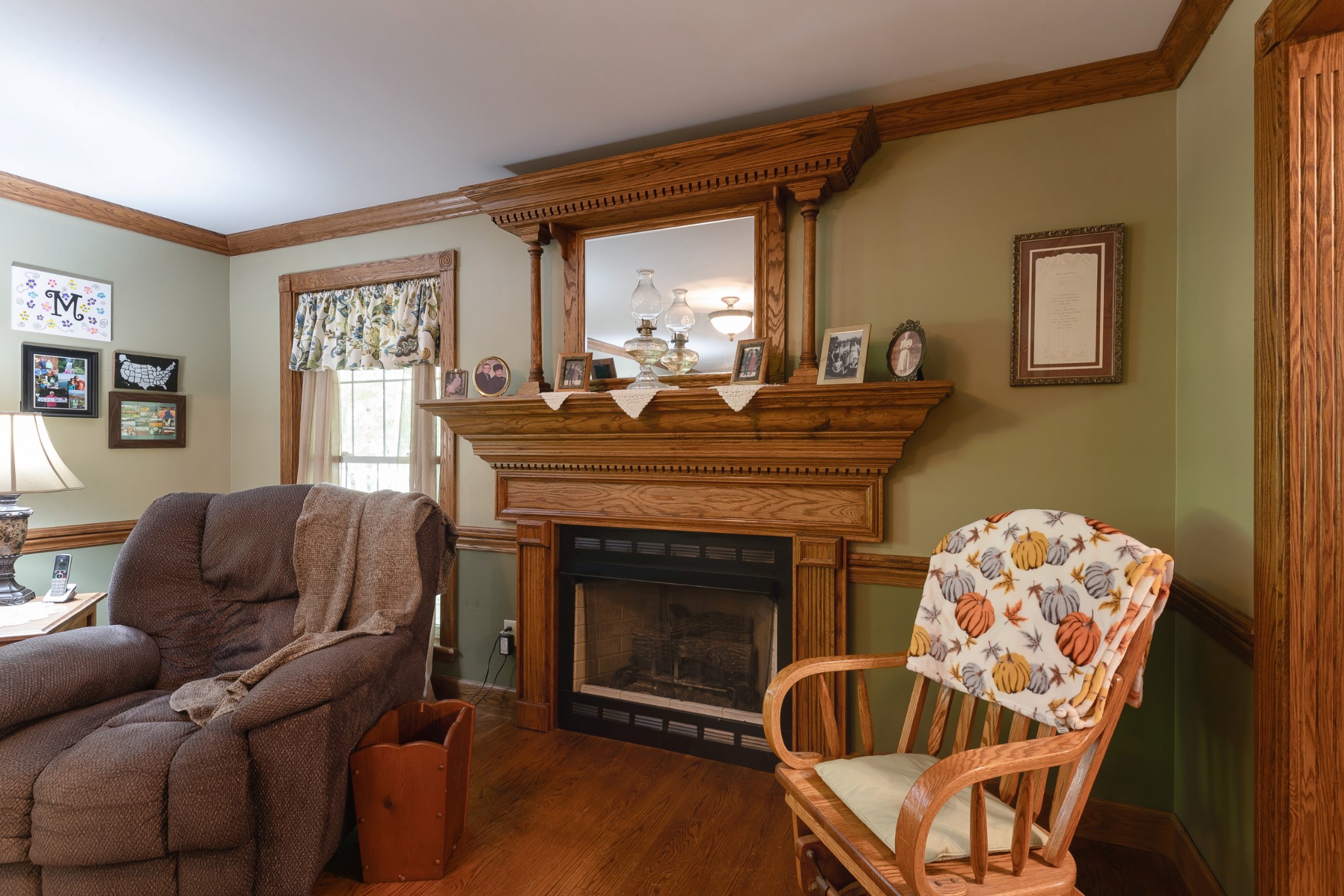 634 Murrell Road Dickson, TN 37055 - Photo 19 of 46 a living room with furniture a window and a fireplace