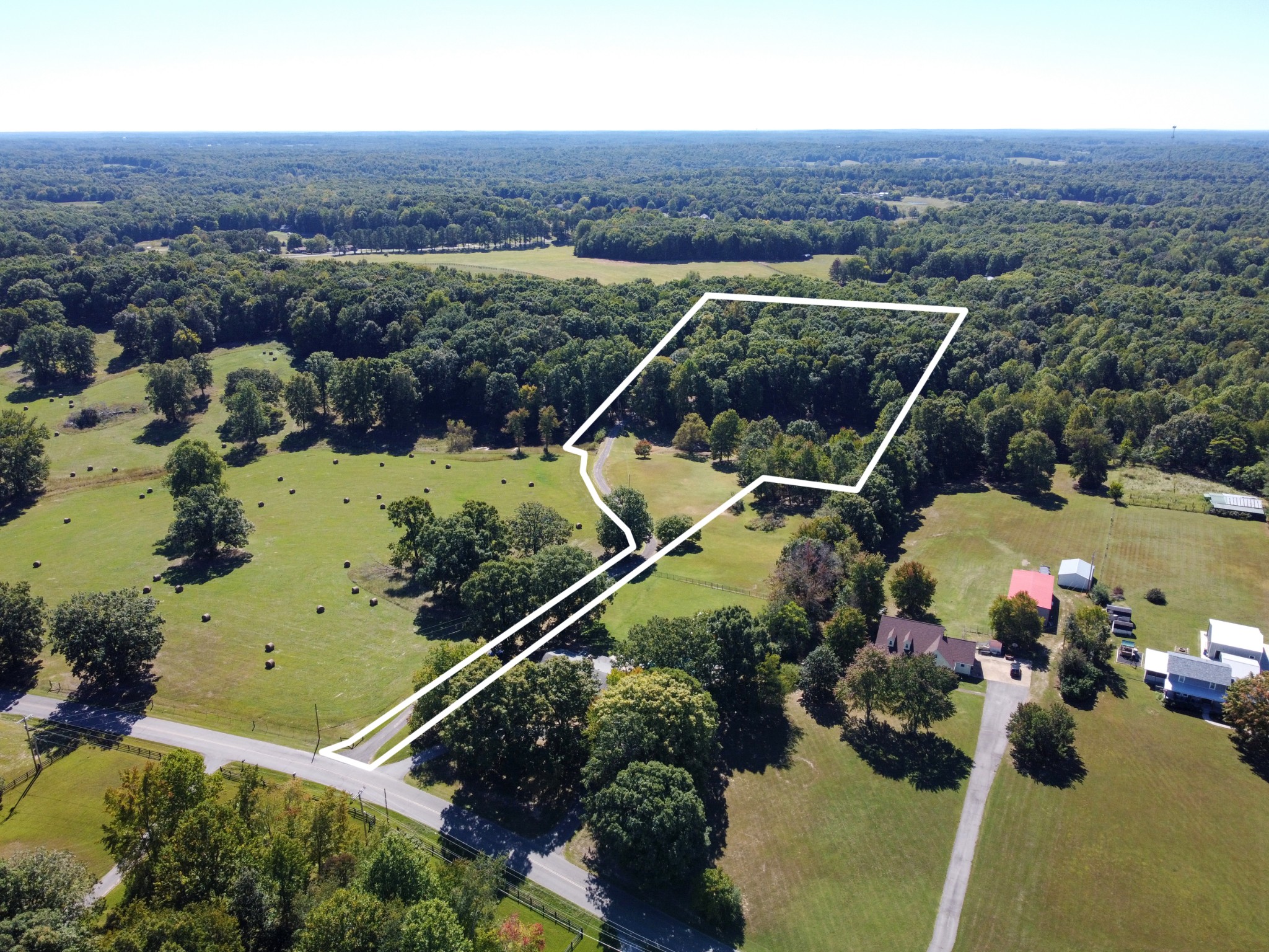 634 Murrell Road Dickson, TN 37055 - Photo 3 of 46 an aerial view of a house with a yard