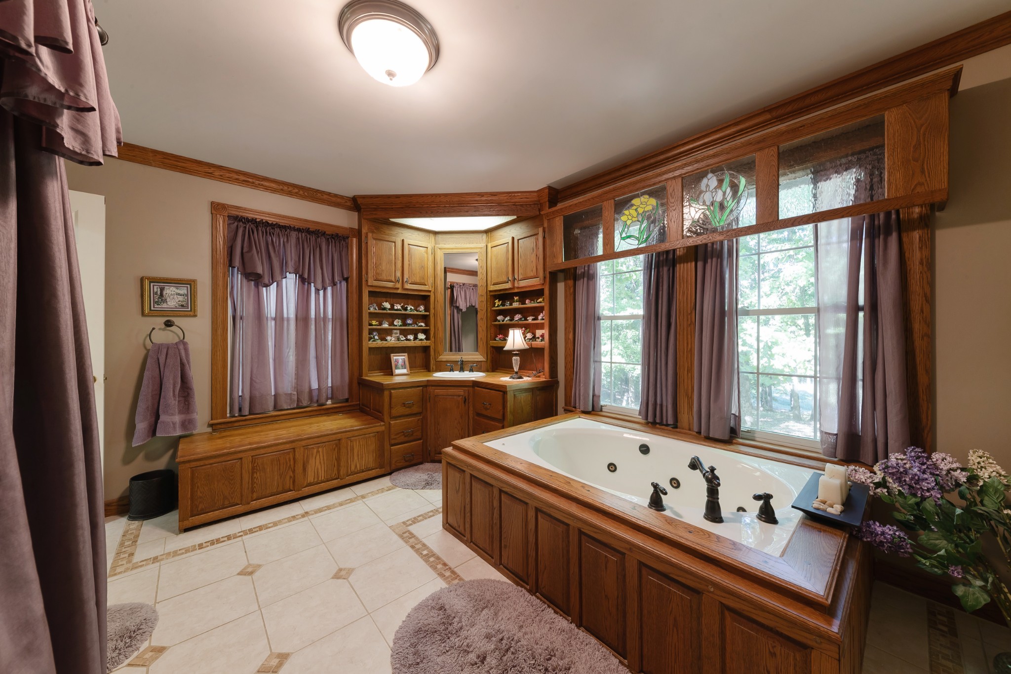 634 Murrell Road Dickson, TN 37055 - Photo 31 of 46 a large spacious bathroom with a tub double vanity and a large window