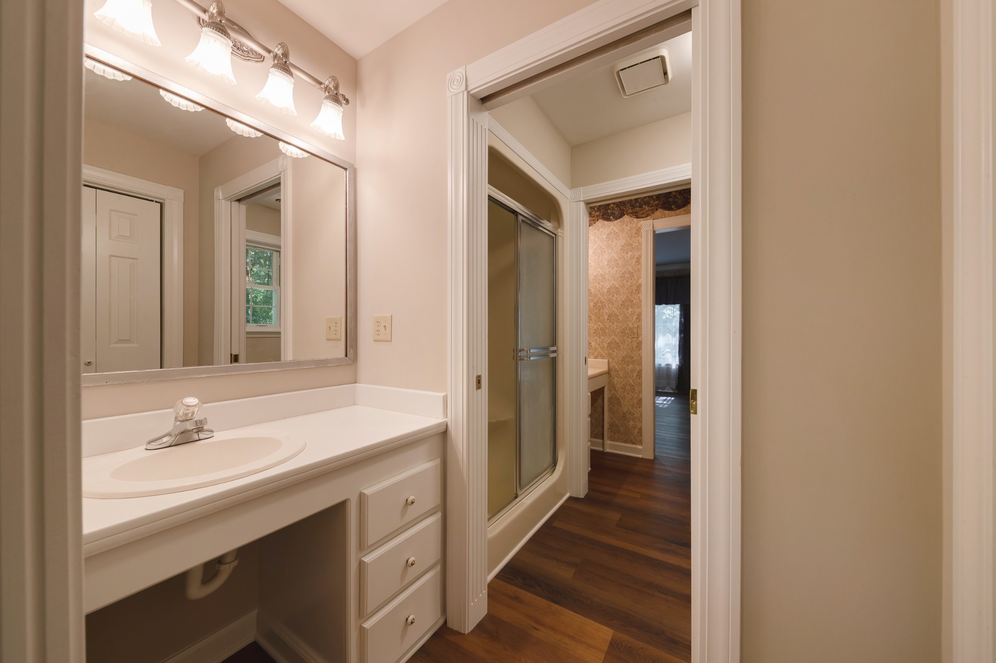 634 Murrell Road Dickson, TN 37055 - Photo 35 of 46 a bathroom with a sink a mirror and a shower