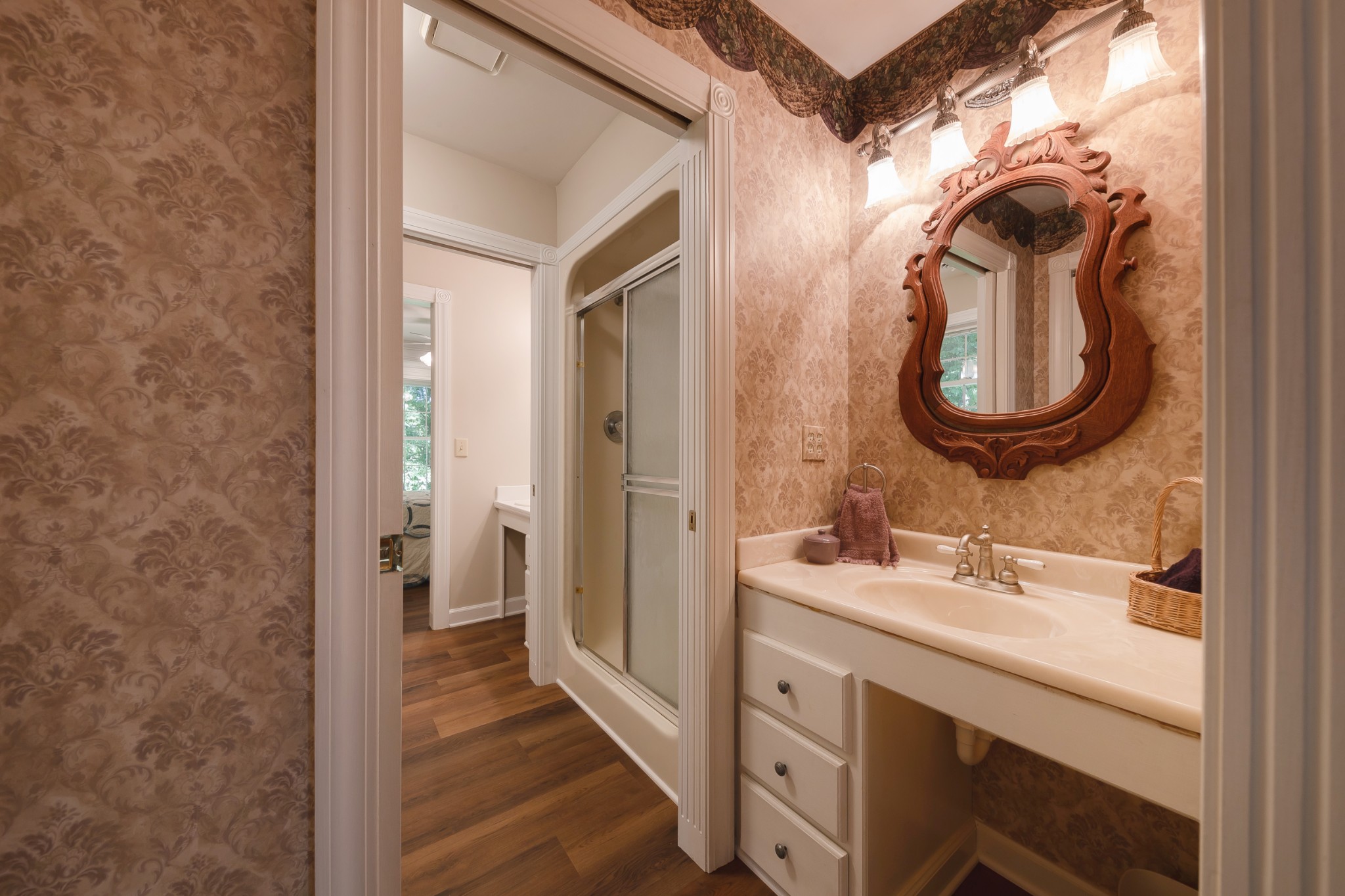 634 Murrell Road Dickson, TN 37055 - Photo 36 of 46 a bathroom with a sink and a mirror