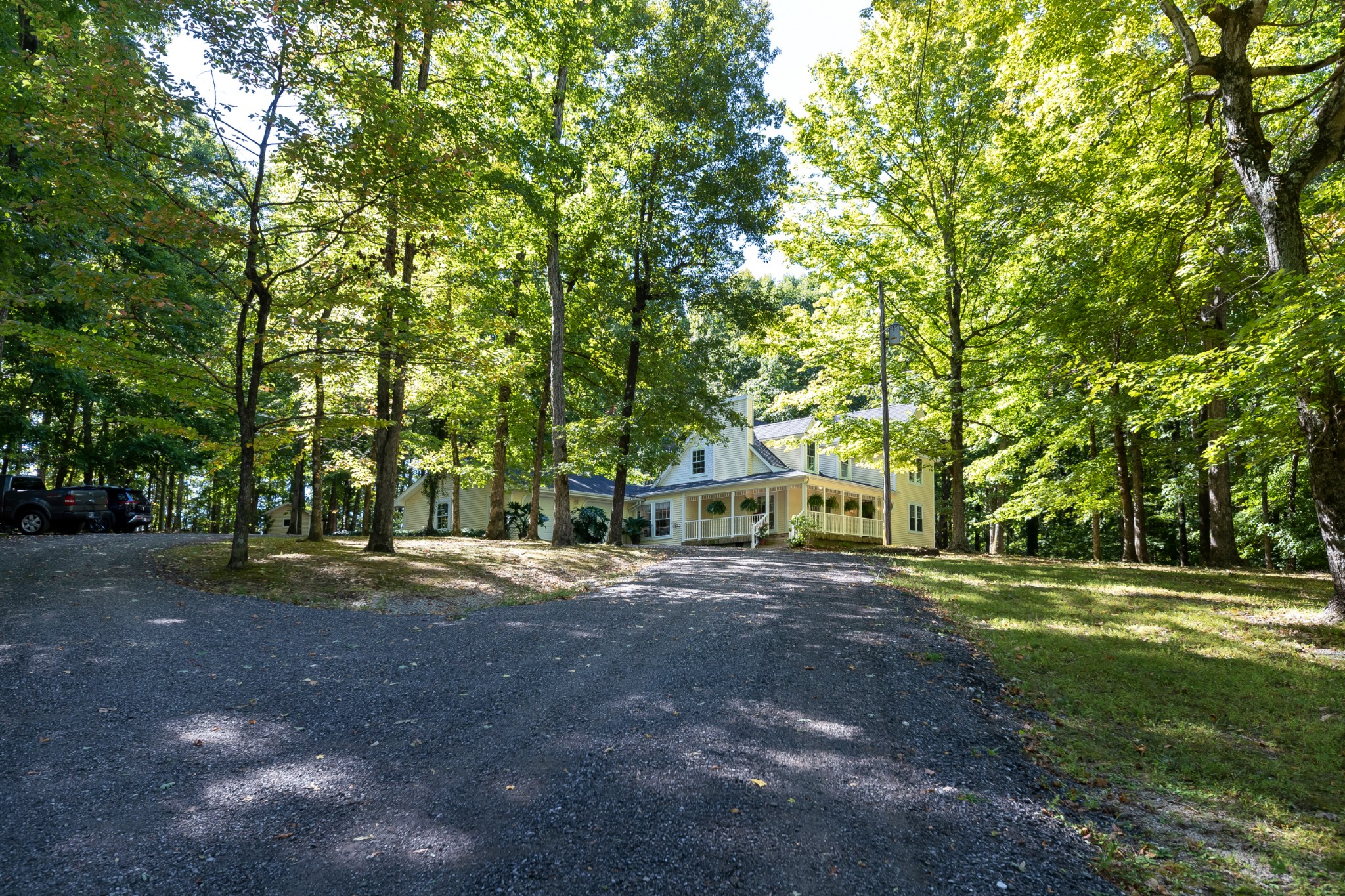 634 Murrell Road Dickson, TN 37055 - Photo 9 of 46 a front view of a house with a yard and garage