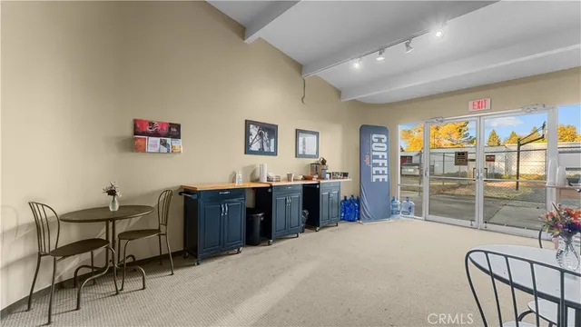 a room with furniture and a flat screen tv