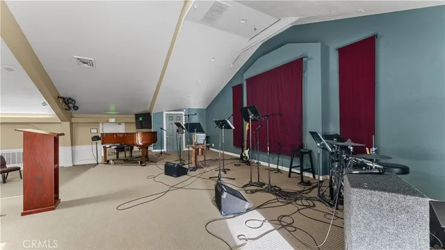 a room with lots of furniture and equipment