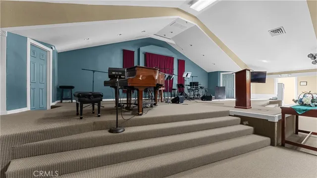 a view of a hallway with windows