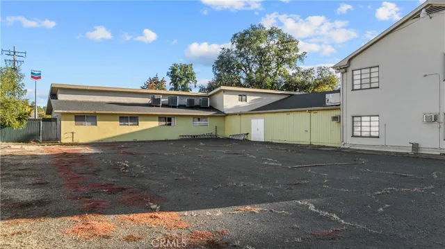 an aerial view of residential building with parking space