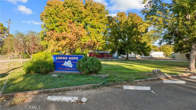 a view of swimming pool with outdoor seating and deck