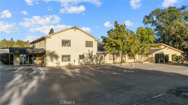 a view of a house with a street