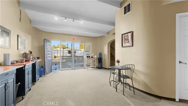 a kitchen with stainless steel appliances a refrigerator and a sink