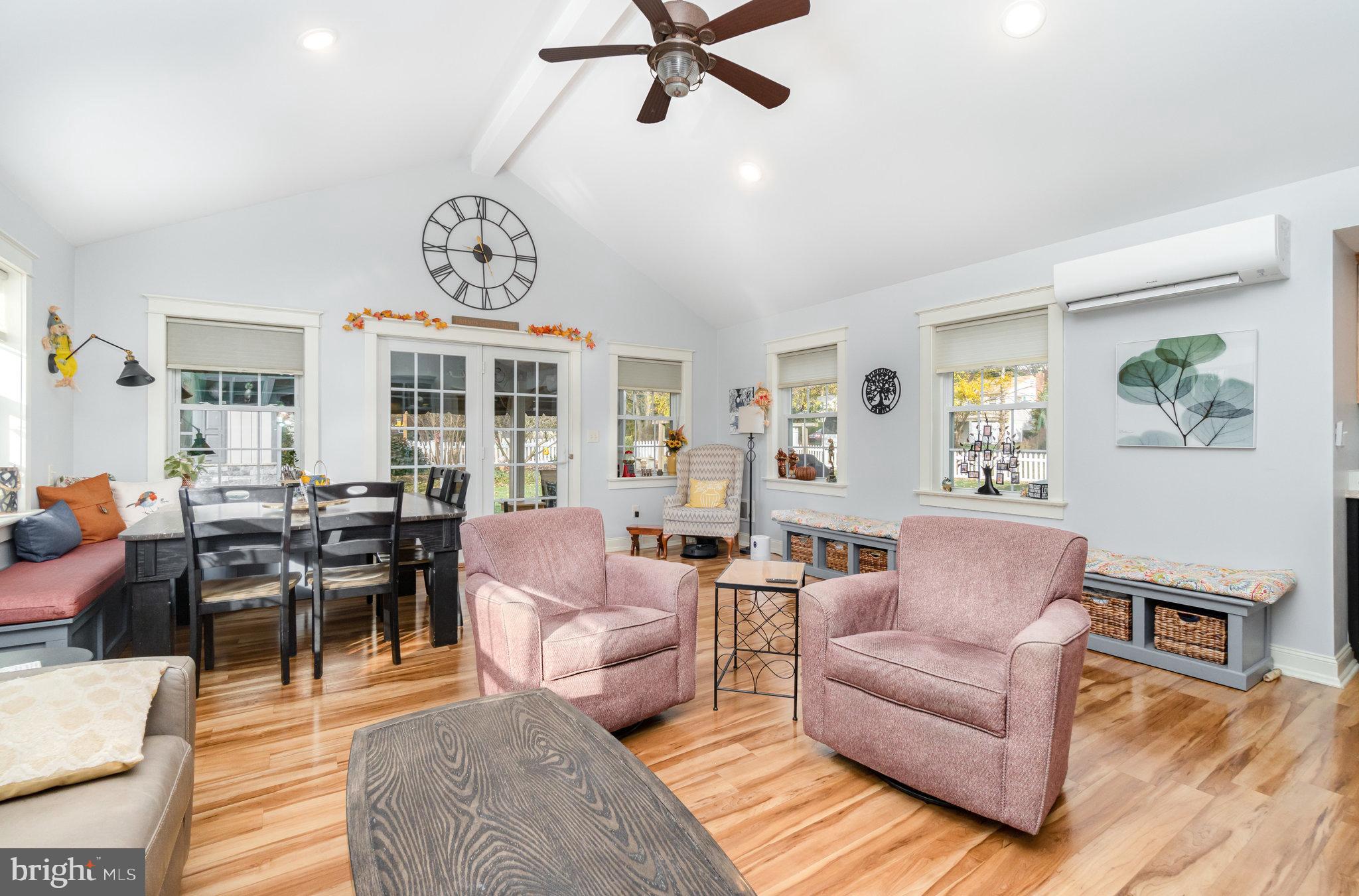430 Orchard Road Mount Joy, PA 17552 - Photo 13 of 41 a living room with furniture a clock on wall and a window