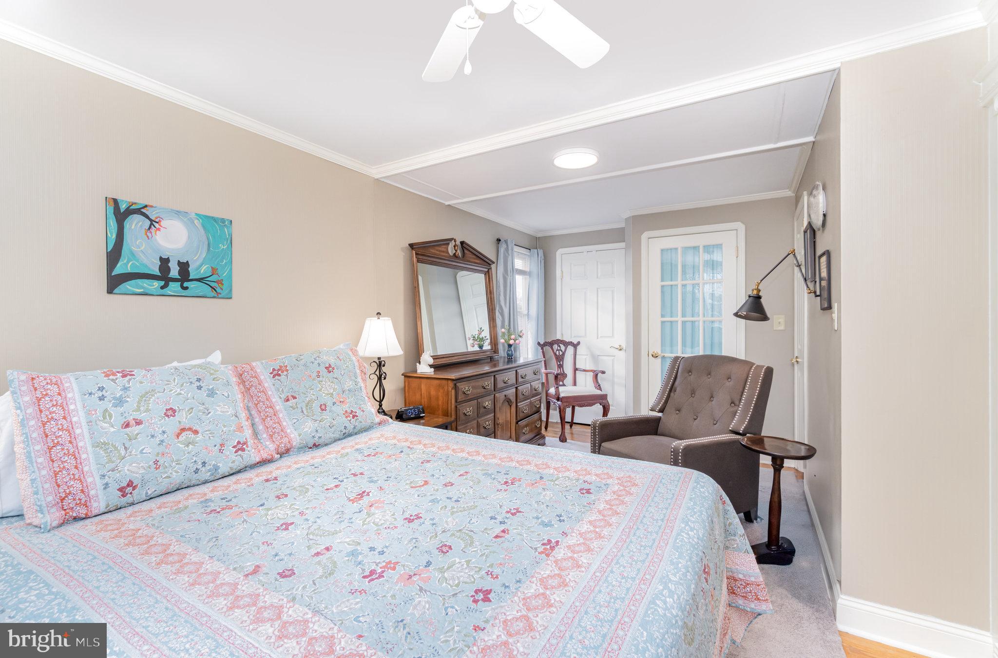 430 Orchard Road Mount Joy, PA 17552 - Photo 23 of 41 a bedroom with a bed and glass windows