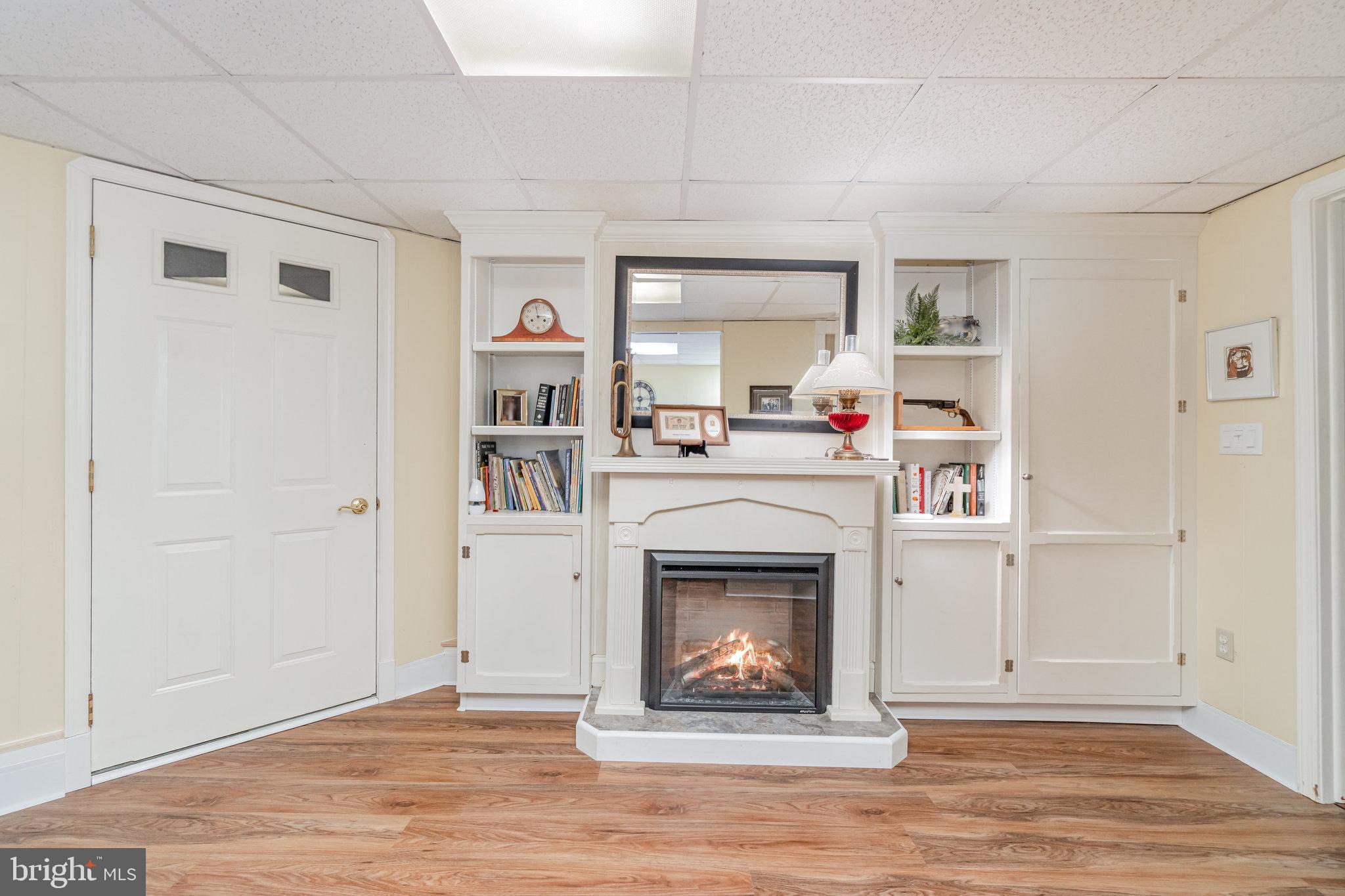 430 Orchard Road Mount Joy, PA 17552 - Photo 27 of 41 a living room with stainless steel appliances furniture a fireplace and a window