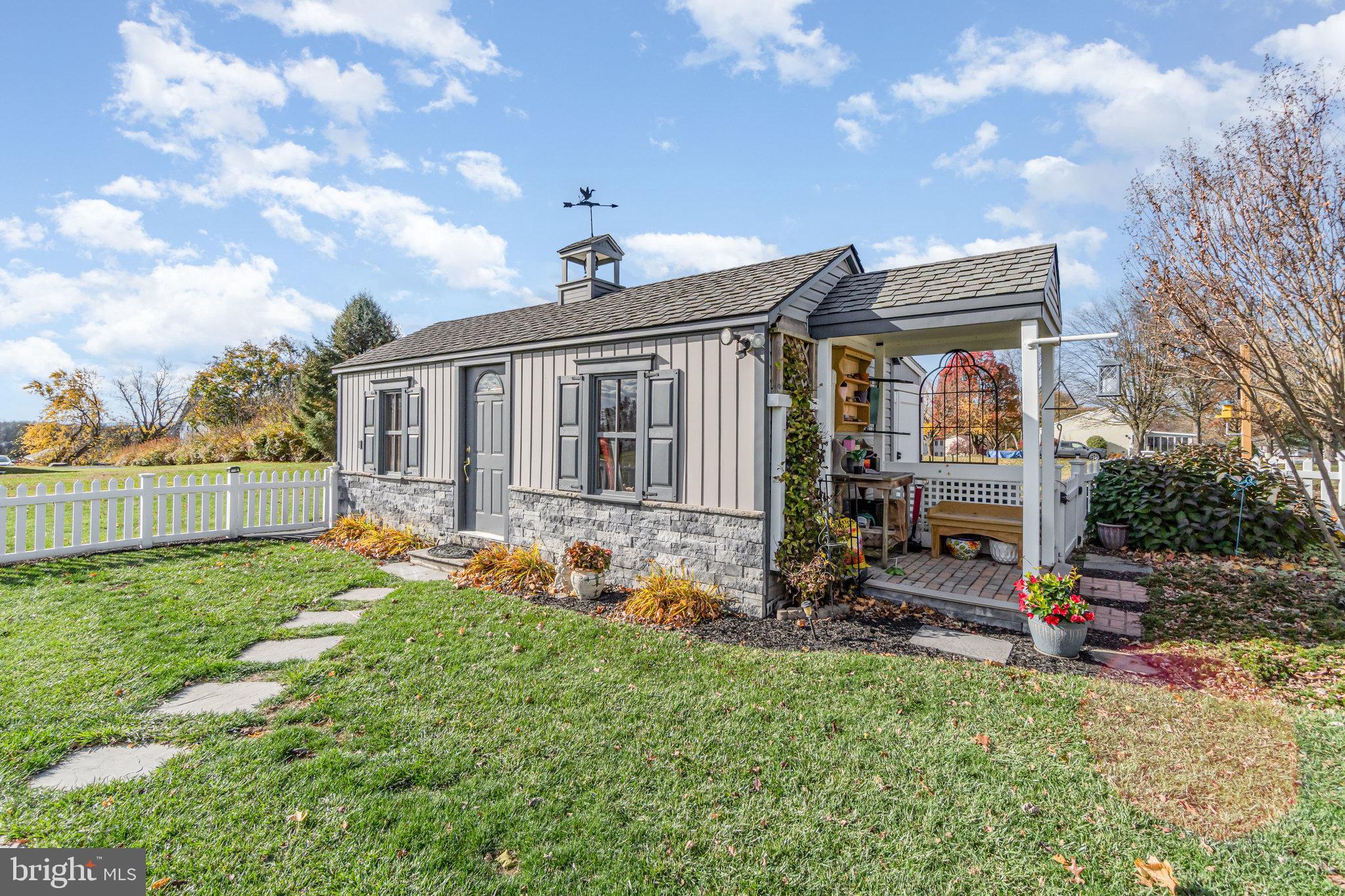 430 Orchard Road Mount Joy, PA 17552 - Photo 34 of 41 a view of a house with backyard sitting area and garden