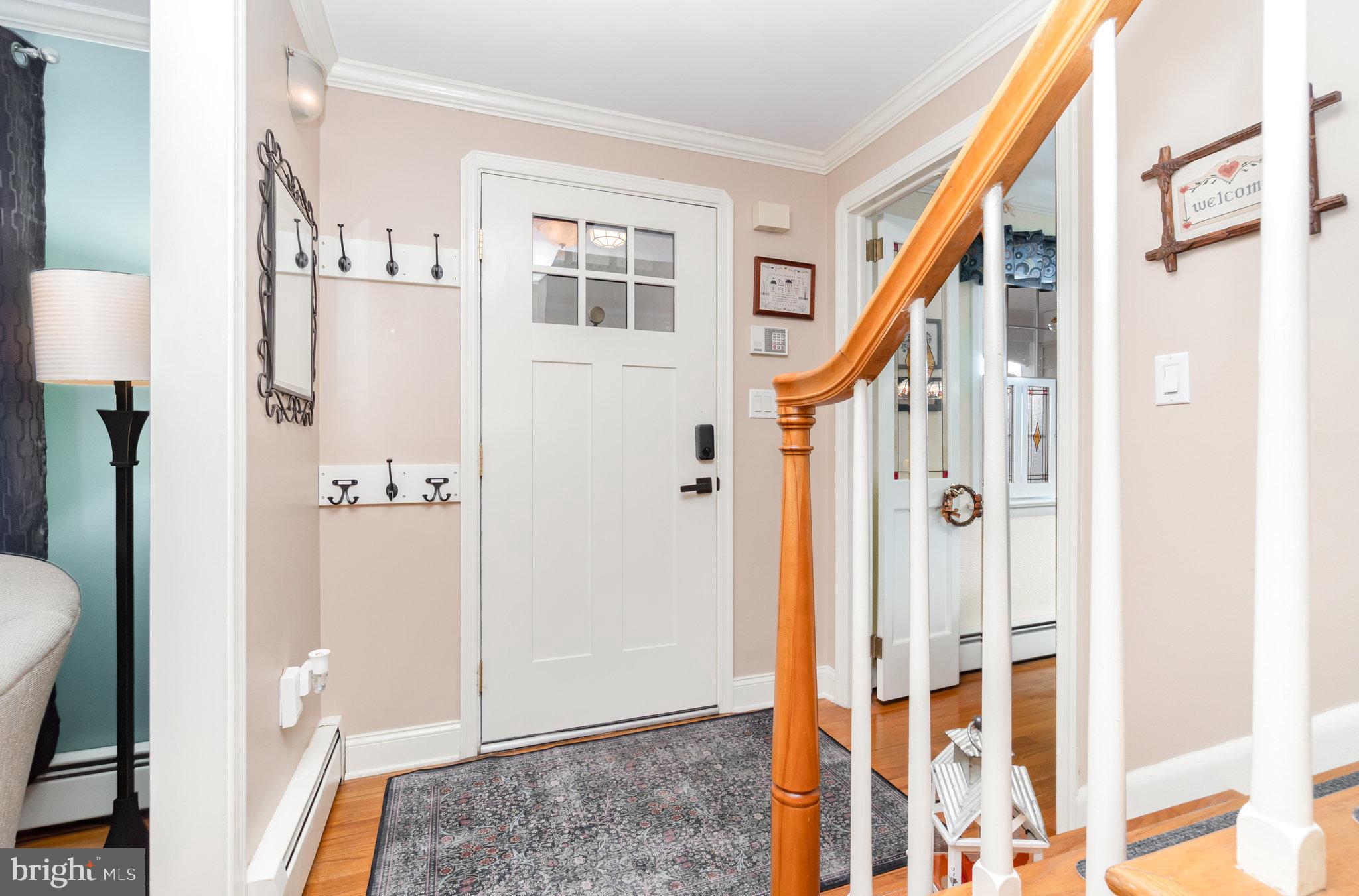 430 Orchard Road Mount Joy, PA 17552 - Photo 6 of 41 a view of a hallway with wooden floor and entryway