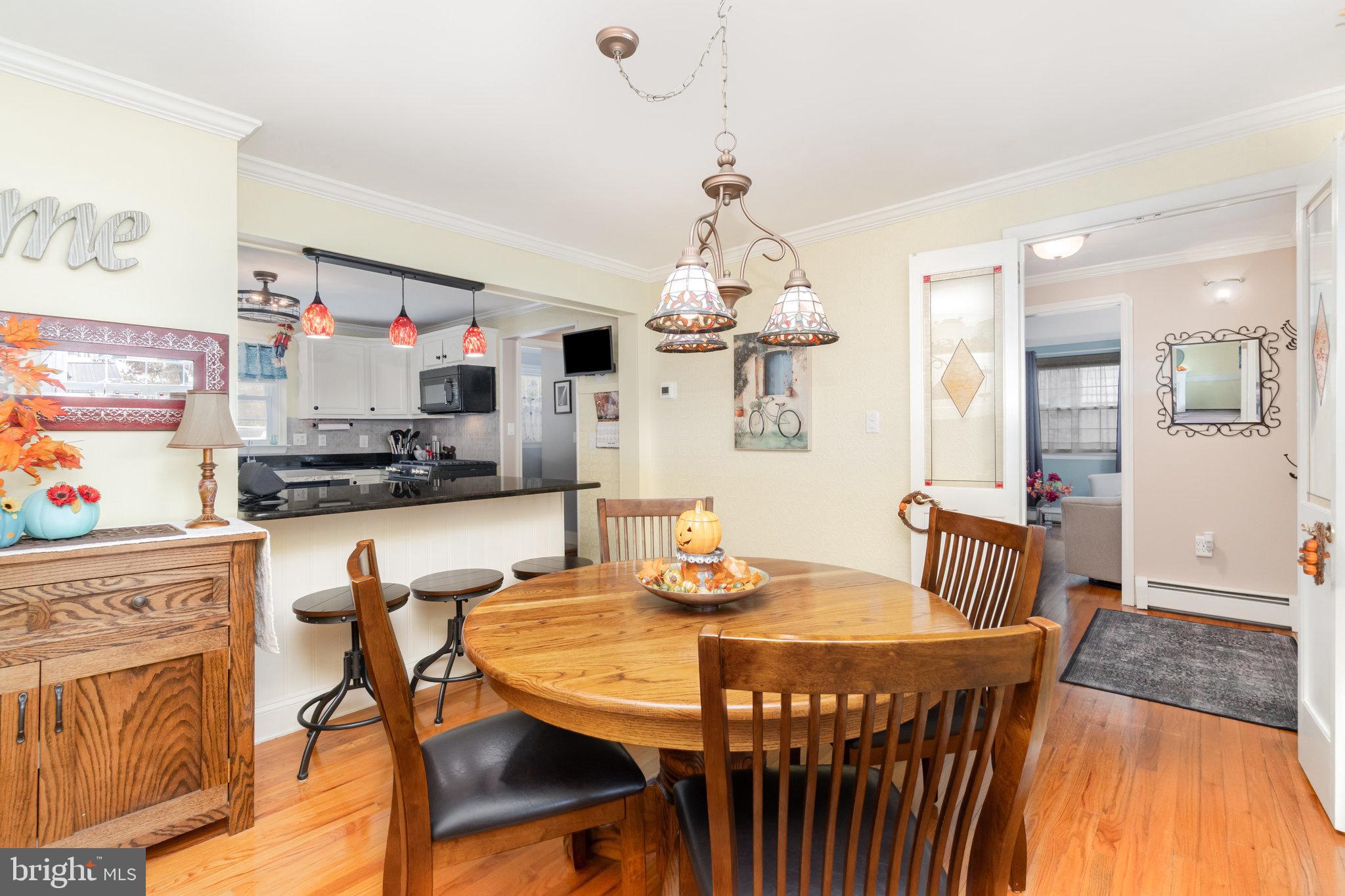 430 Orchard Road Mount Joy, PA 17552 - Photo 8 of 41 a view of a dining room with furniture and wooden floor