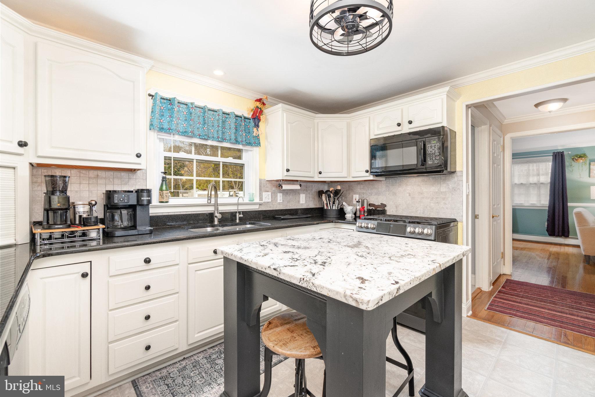 430 Orchard Road Mount Joy, PA 17552 - Photo 10 of 41 a kitchen with a stove a sink and a refrigerator