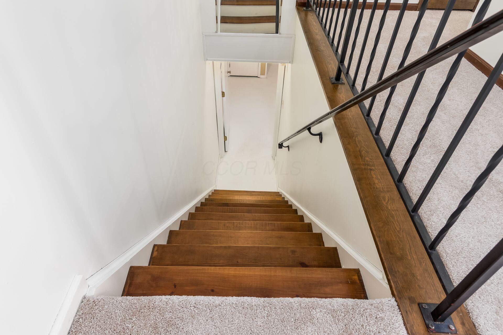 4765 Coach Road Columbus, OH 43220 - Photo 37 of 47 Stairs from end of entry hall to lower level (LL)
