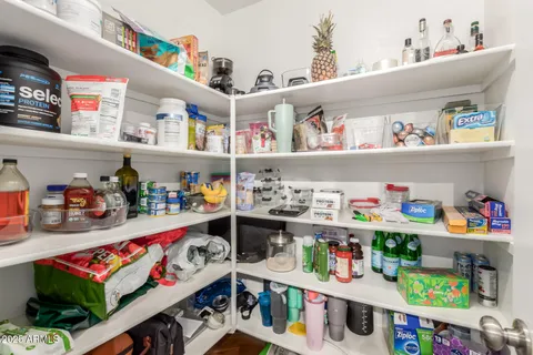 a room with furniture and a wooden floor