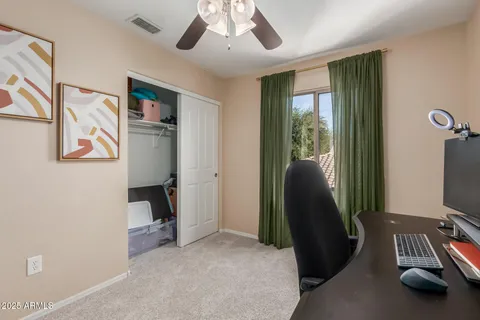 a view of a livingroom with furniture and windows
