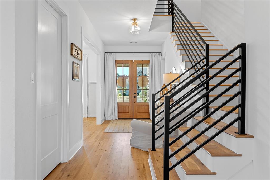 216 Wycliff Drive China Spring, TX 76633 - Photo 7 of 40 a view of entryway with wooden floor and stairs
