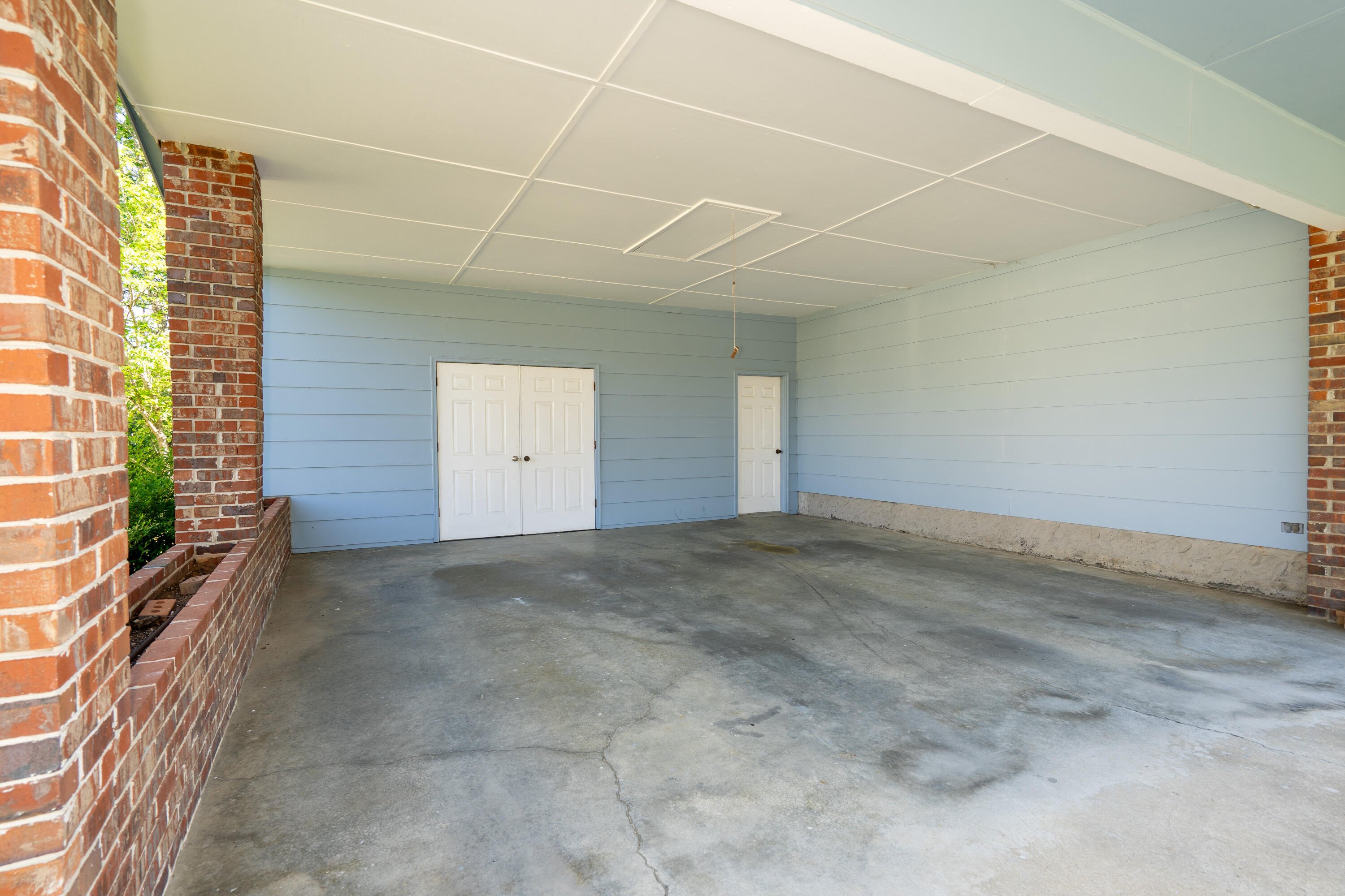 302 Johnson Street LaFayette, GA 30728 - Photo 32 of 35 Large Carport with utility/workroom
